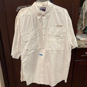 Reel legends Performance clothing. White fishing shirt. Dry cleaned.